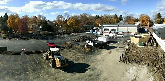 Bucket truck working at a commercial construction site.